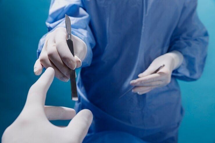doctor-receiving-medical-scalpel-operation_23-2149299311